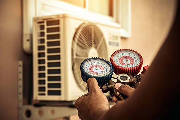 Professional Heat Pump Repair technician working in Floodwood, MN